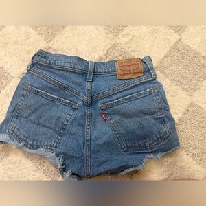 Levi's Medium Blue Denim Cutoff Shorts with Frayed Hem